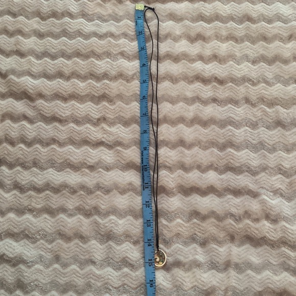 Shell necklace with small colored stones inside on thin black stringed lanyard - Picture 4 of 6